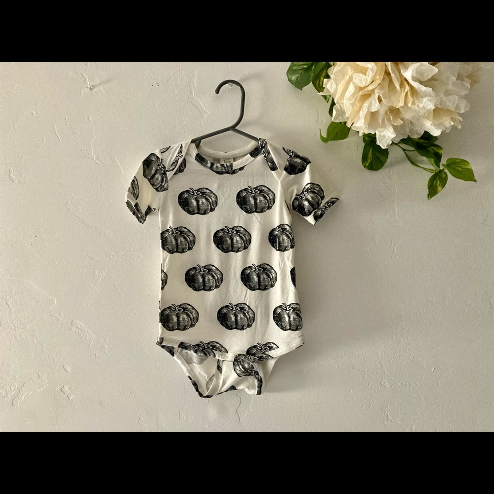 Kate Quinn Short Sleeve Lap Neck Bodysuit